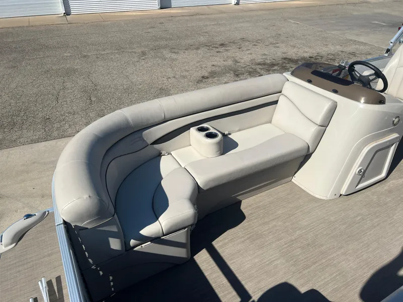 Slide: The Image of 2017 Bennington 24SPDX pontoon boat interior seating area. - 11