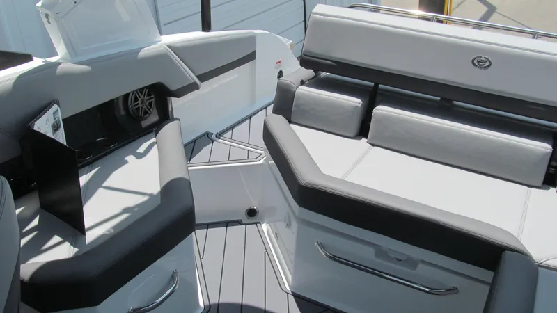 Slide: The Image of Interior seating of 2025 Cobalt R4 boat with modern design and gray upholstery. - 15
