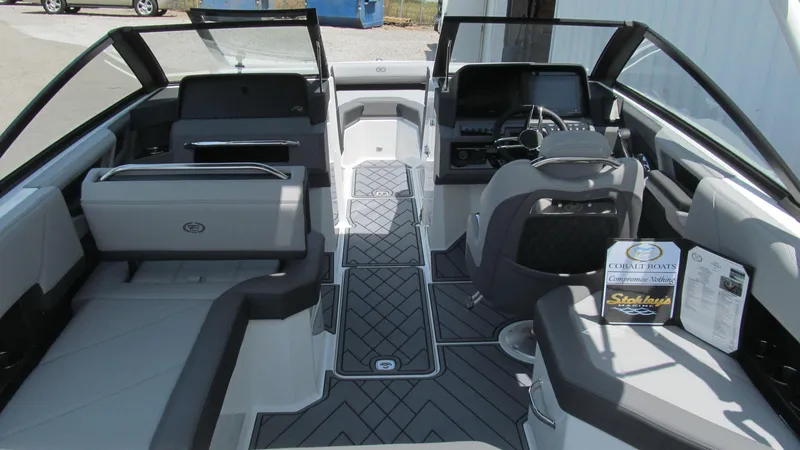 Slide: The Image of 2025 Cobalt R4 boat interior with modern seating and dashboard. - 5