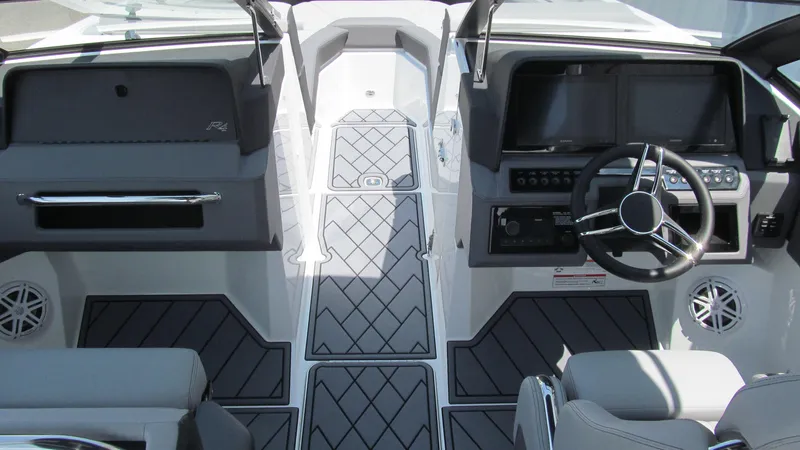 Slide: The Image of 2025 Cobalt R4 boat interior with modern dashboard and seating. - 6