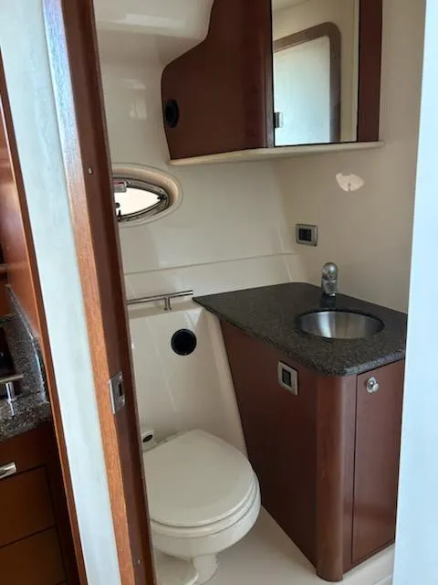 Slide: The Image of Luxurious bathroom in 2007 Sea Ray 380 Sundancer yacht with modern fixtures. - 5