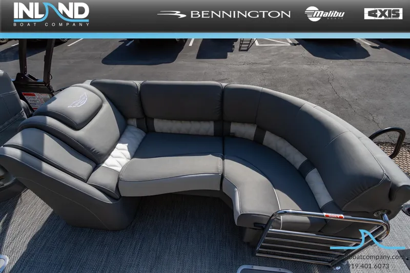 Slide: The Image of 2024 Bennington 23 RFB boat with luxurious gray seating on display. - 12