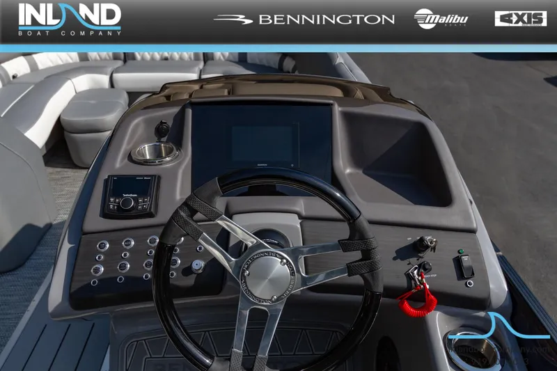 Slide: The Image of 2024 Bennington 23 RFB boat dashboard with steering wheel and control panel. - 15