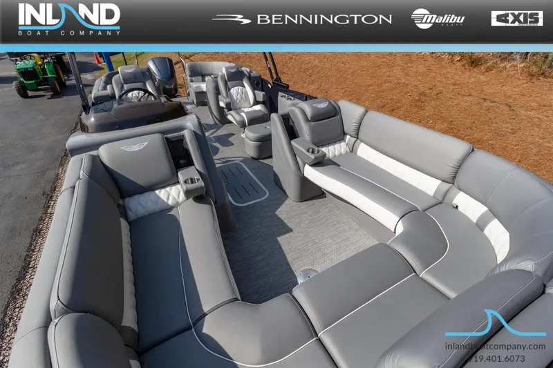 Slide: The Image of 2024 Bennington 23 RFB pontoon boat with luxurious seating and modern design. - 2