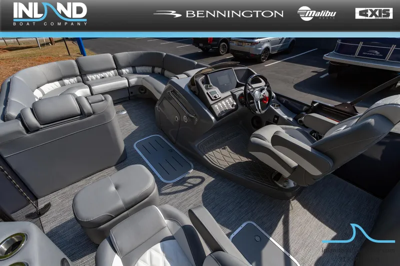 Slide: The Image of 2024 Bennington 23 RFB pontoon boat interior with luxurious seating and modern dashboard. - 21