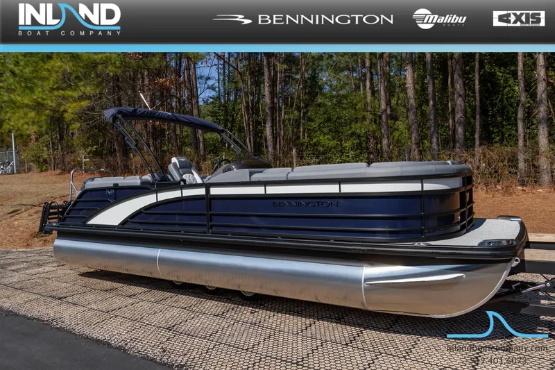 Slide: The Image of 2024 Bennington 23 RFB pontoon boat displayed outdoors. - 3
