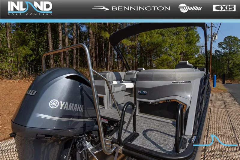 Slide: The Image of 2024 Bennington 23 RFB boat with Yamaha engine, displayed by Inland Boat Company. - 7