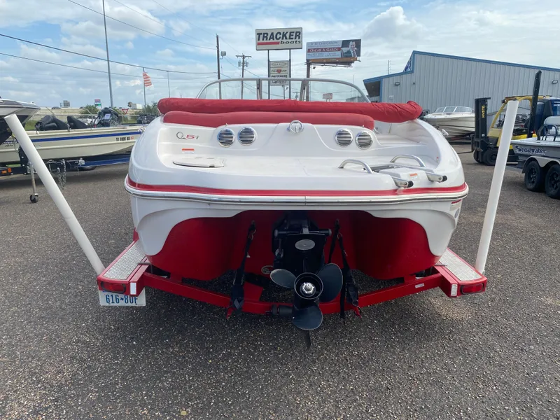 Slide: The Image of 2010 Tahoe Q5i boat rear view at dealership. - 5