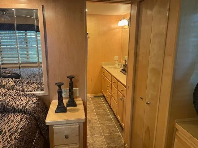 Slide: The Image of Interior of 2007 Thoroughbred houseboat with bedroom and bathroom view. - 17