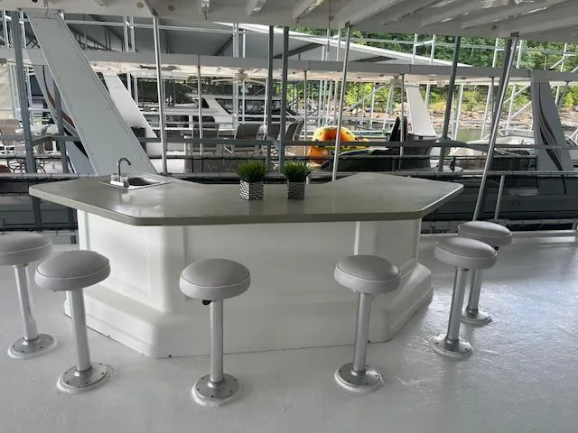 Slide: The Image of Houseboat bar area with stools, Thoroughbred model, 2007, docked at marina. - 32