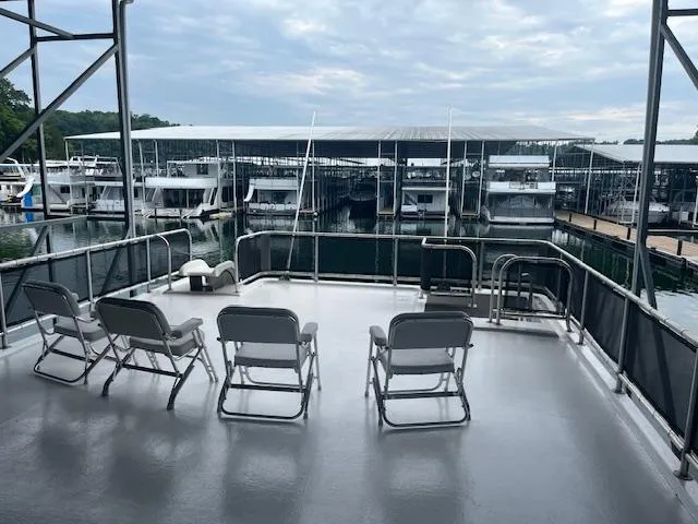 Slide: The Image of Top deck of a 2007 Thoroughbred Houseboat with marina view. - 34