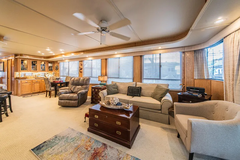 Slide: The Image of Luxurious 2002 Sumerset 75 houseboat interior with cozy living area and modern furnishings. - 15