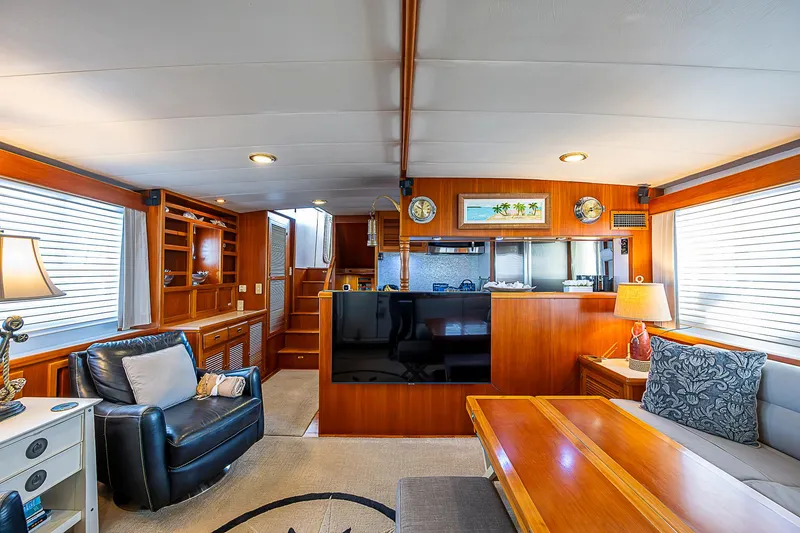 Slide: The Image of Luxurious interior of 2001 Kadey-Krogen 58 yacht with elegant wood finishes and modern amenities. - 3