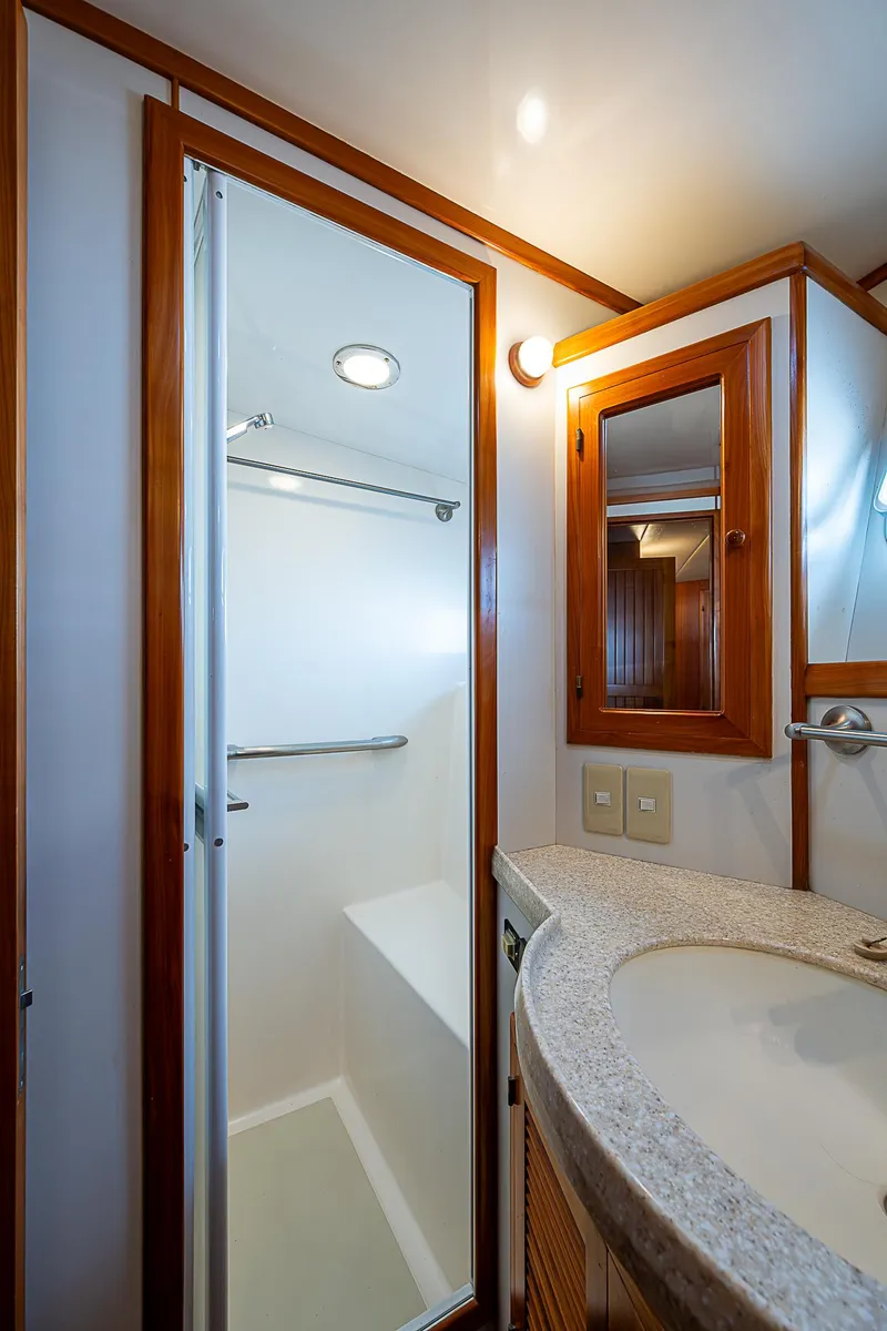 Slide: The Image of Bathroom interior of 2001 Kadey-Krogen 58 yacht with shower and vanity. - 30