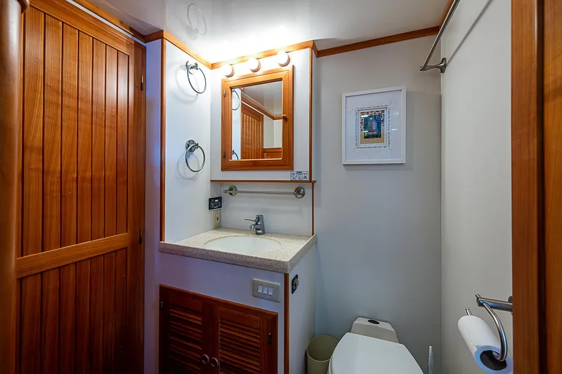 Slide: The Image of Bathroom interior of 2001 Kadey-Krogen 58 yacht with wooden accents and modern fixtures. - 39