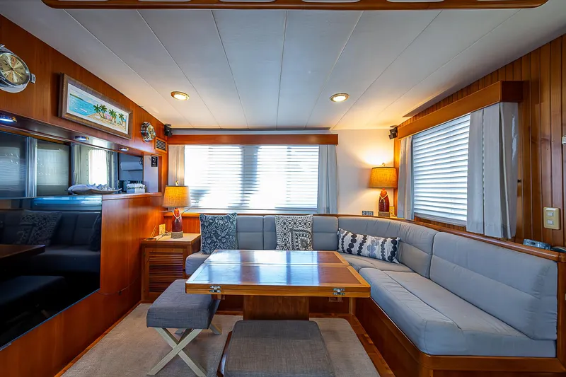 Slide: The Image of Luxurious interior of 2001 Kadey-Krogen 58 yacht with cozy seating and elegant decor. - 7