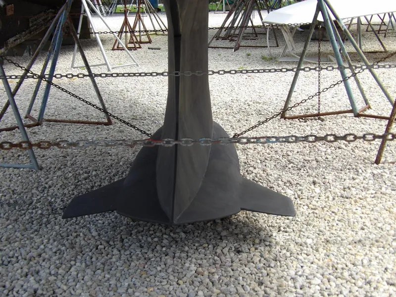 Slide: The Image of Bottom view of a 2000 Hunter 460 sailboat keel on gravel. - 12