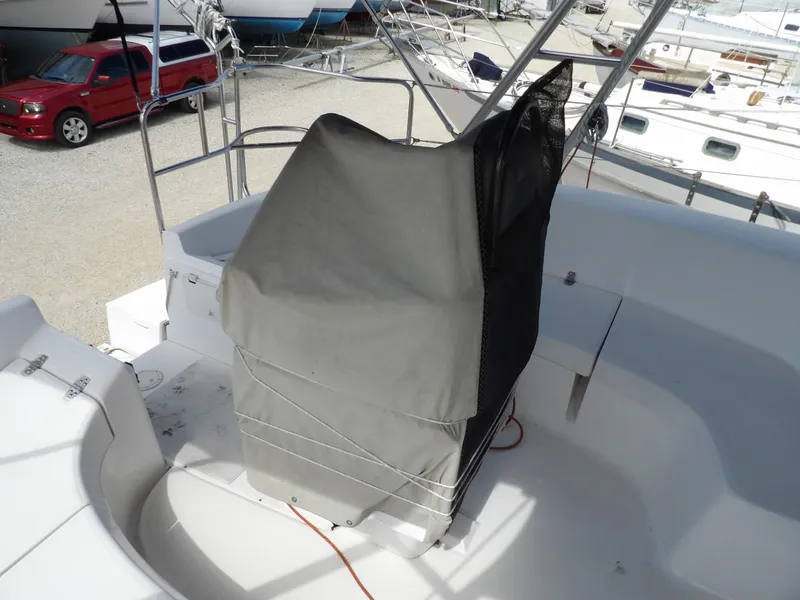 Slide: The Image of Covered helm station on a 2000 Hunter 460 sailboat. - 13