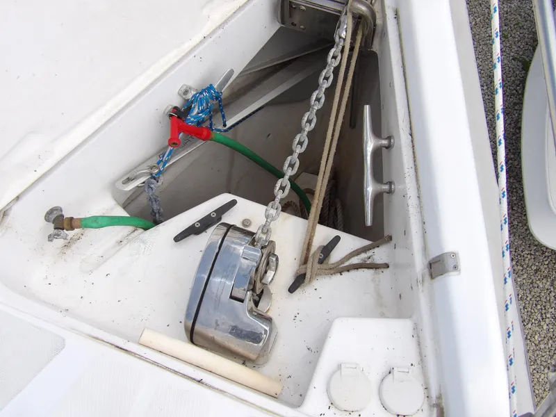 Slide: The Image of Anchor locker of a 2000 Hunter 460 sailboat with chain and windlass. - 20
