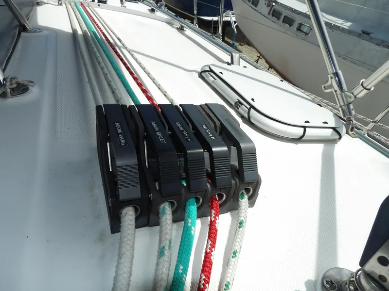 Slide: The Image of Close-up of rope clutches on a 2000 Hunter 460 sailboat deck. - 33