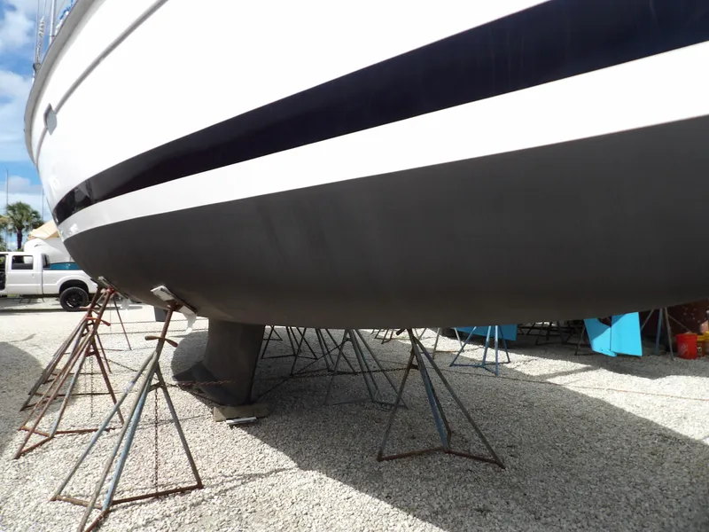 Slide: The Image of Hunter 460 sailboat from 2000 on stands for maintenance. - 8