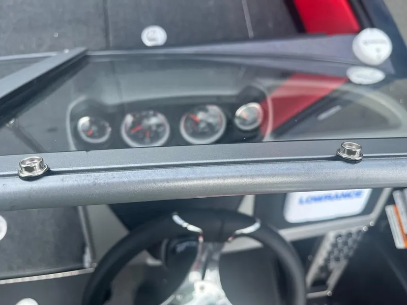 Slide: The Image of Ranger 1880MS 2025 boat dashboard with steering wheel and instrument panel. - 3