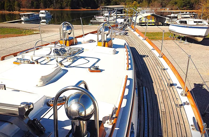 Slide: The Image of 1983 Little Harbor 44 yacht on dry dock, showcasing deck and fittings. - 14