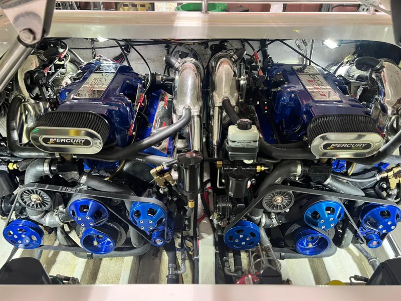 Slide: The Image of 2001 Fountain Lightning Executioner 35 twin Mercury engines in engine compartment. - 20