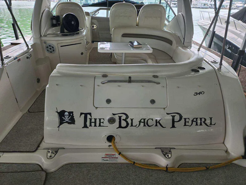 Slide: The Image of 2006 Sea Ray 340 Sundancer boat interior with The Black Pearl name. - 18
