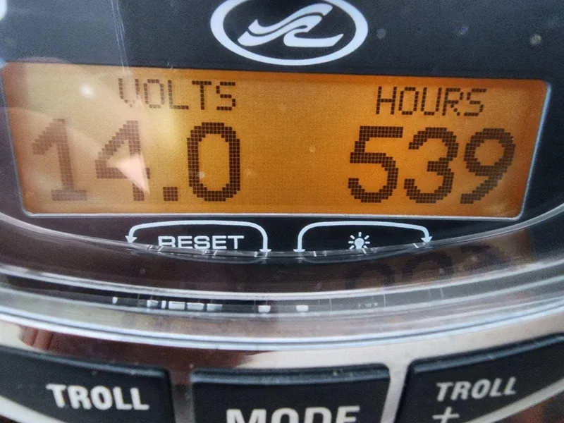 Slide: The Image of Close-up of Sea Ray 340 Sundancer 2006 boat display showing 14 volts and 539 hours. - 4