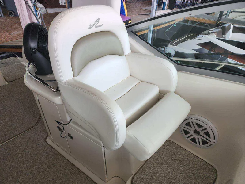 Slide: The Image of Captain's chair on a 2006 Sea Ray 340 Sundancer boat. - 5