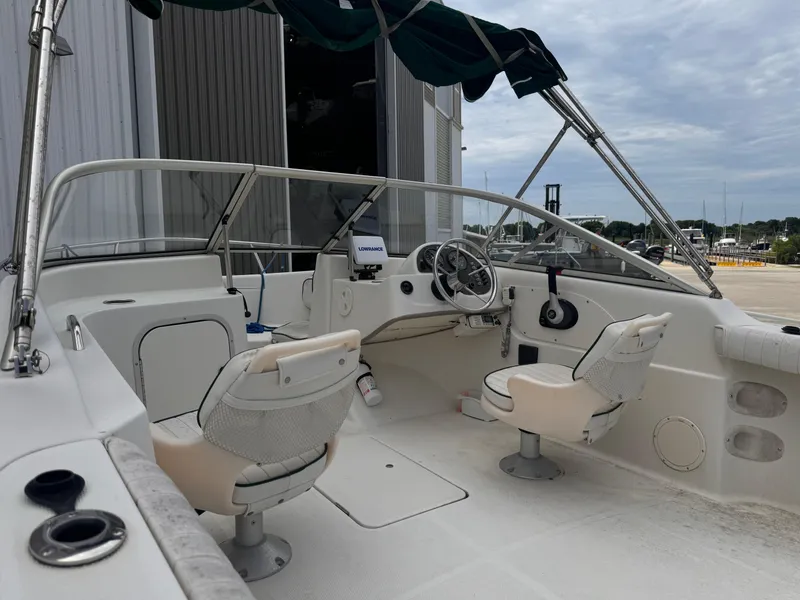 Slide: The Image of 2001 Trophy 1900 Dual Console boat interior with steering wheel and seating. - 3