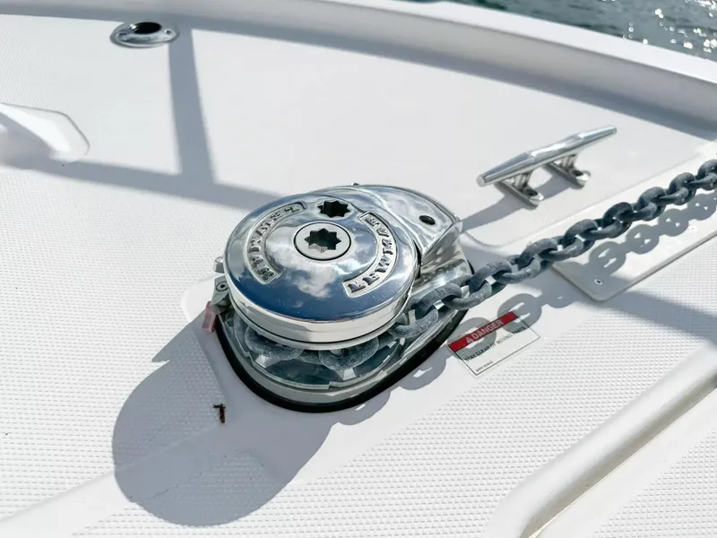 Slide: The Image of Anchor windlass on 2020 Boston Whaler 325 Conquest boat deck. - 13