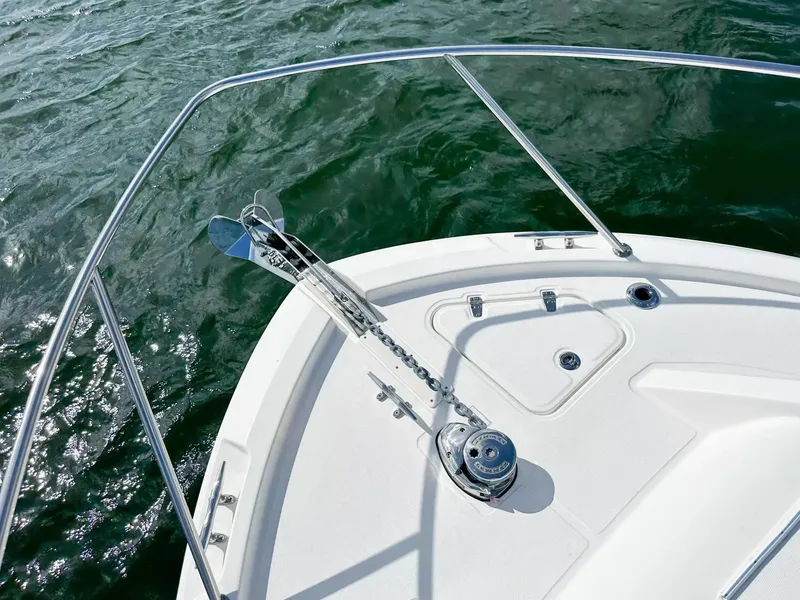 Slide: The Image of Bow of 2020 Boston Whaler 325 Conquest with anchor and railing. - 17