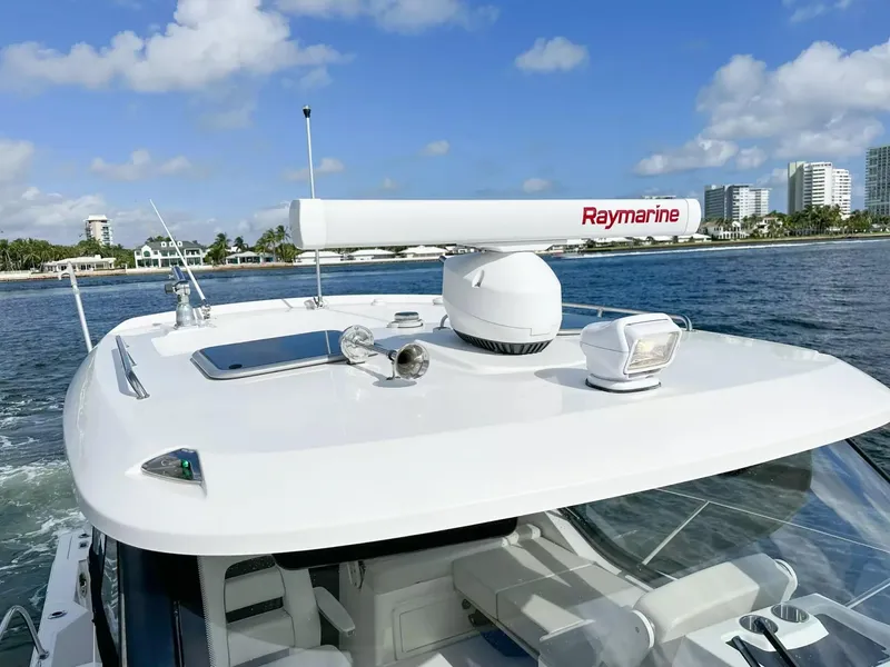 Slide: The Image of 2020 Boston Whaler 325 Conquest with Raymarine radar on the water. - 19