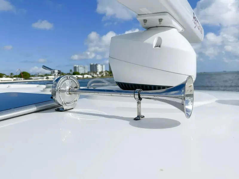 Slide: The Image of Close-up of a 2020 Boston Whaler 325 Conquest boat horn and radar system. - 22