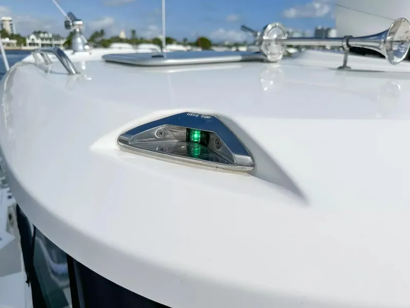 Slide: The Image of 2020 Boston Whaler 325 Conquest navigation light on deck. - 24