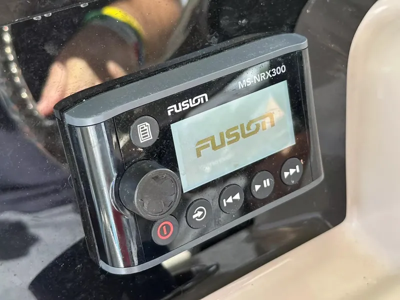 Slide: The Image of Fusion MS-NRX300 marine stereo on a 2020 Boston Whaler 325 Conquest boat. - 36