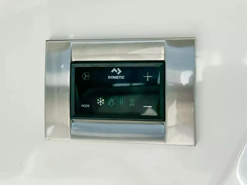 Slide: The Image of Dometic control panel on 2020 Boston Whaler 325 Conquest boat. - 43