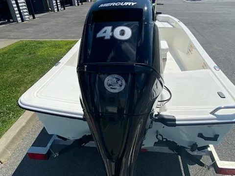 Slide: The Image of 2024 Mako Pro Skiff 15 CC with Mercury 40 outboard engine on trailer. - 10