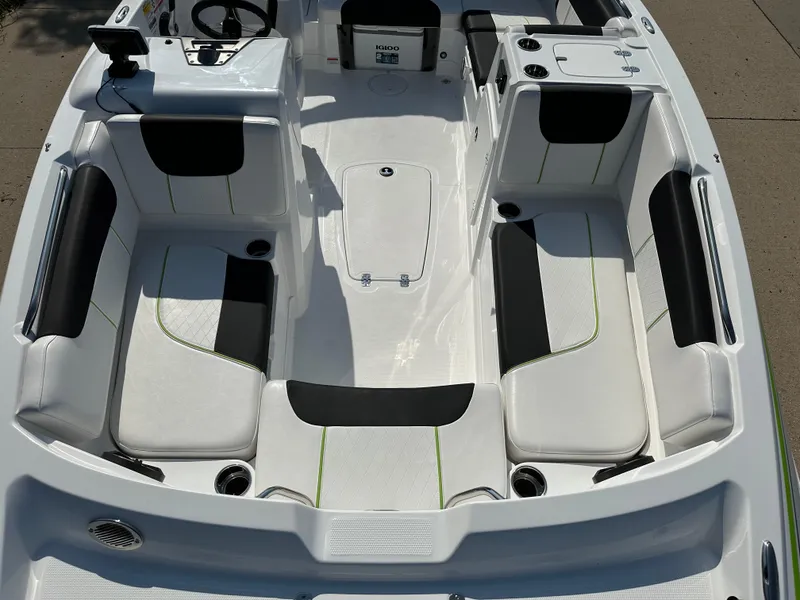 Slide: The Image of 2024 Tahoe 1950 boat interior with white and black seating, modern design. - 3