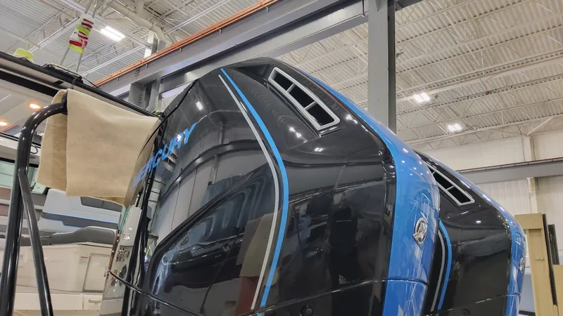 Slide: The Image of 2025 Formula 380 Super Sport Crossover OB in a showroom. - 15