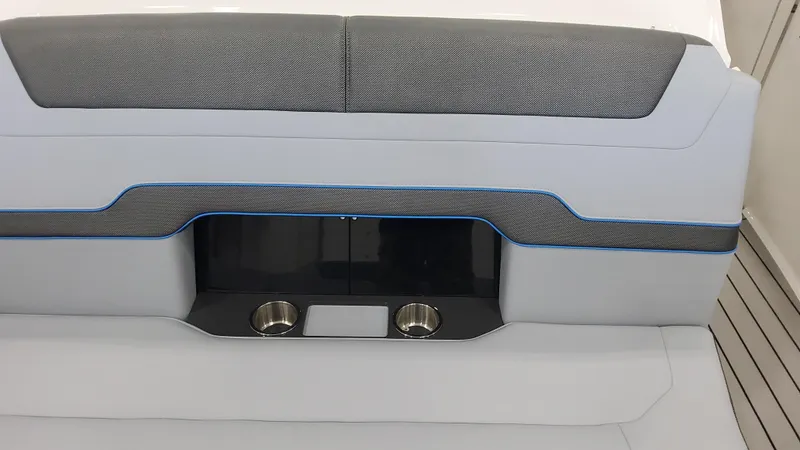 Slide: The Image of 2025 Formula 380 Super Sport Crossover OB interior seating with cup holders. - 21