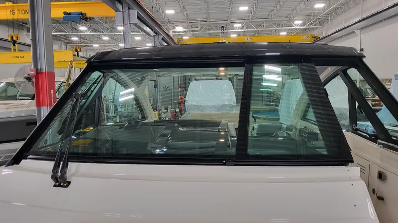 Slide: The Image of 2025 Formula 380 Super Sport Crossover OB in a manufacturing facility. - 22