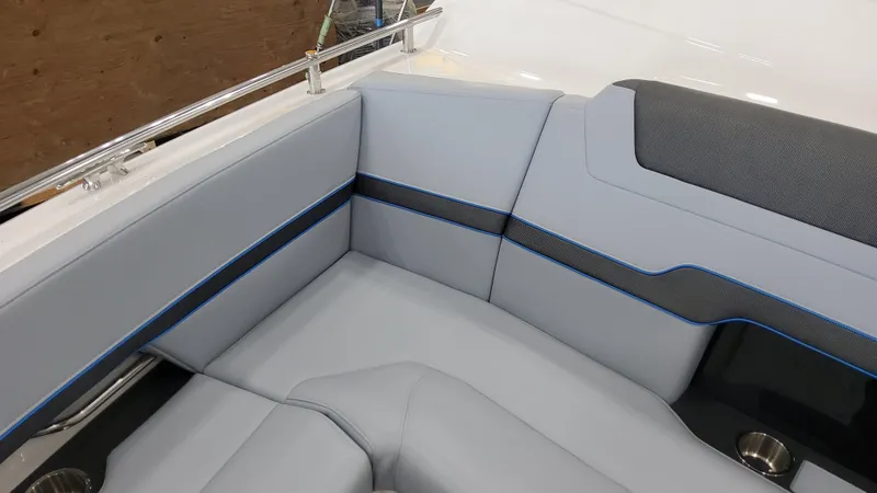 Slide: The Image of 2025 Formula 380 Super Sport Crossover OB interior seating with gray and blue accents. - 23