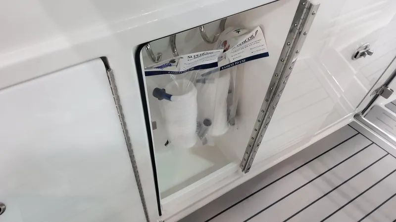 Slide: The Image of Storage compartment on a 2025 Formula 380 Super Sport Crossover OB boat. - 33