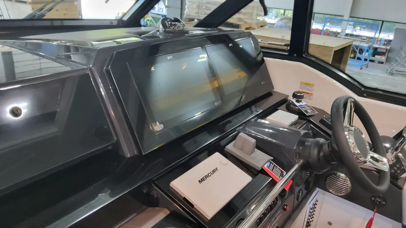 Slide: The Image of 2025 Formula 380 Super Sport Crossover OB dashboard with advanced navigation system. - 36