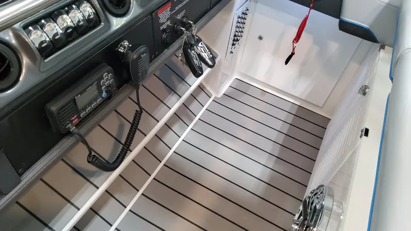 Slide: The Image of 2025 Formula 380 Super Sport Crossover OB cockpit with advanced controls and sleek flooring. - 38