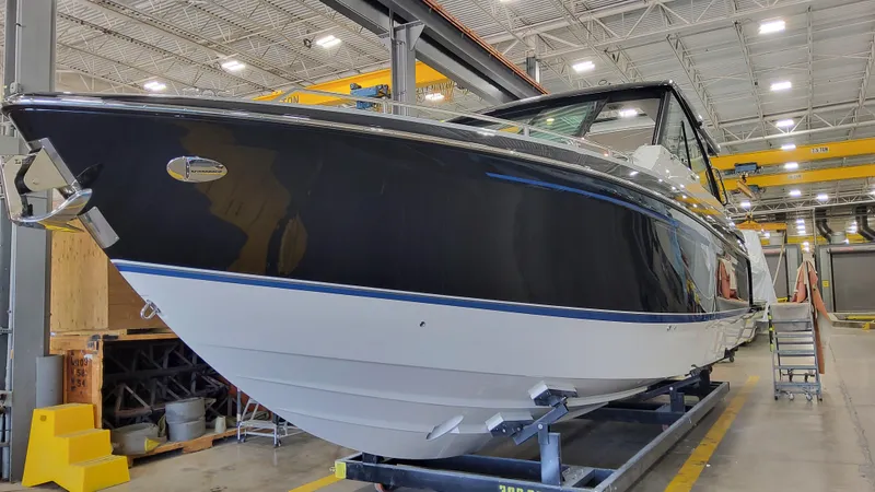 Slide: The Image of 2025 Formula 380 Super Sport Crossover OB in a boatyard. - 4