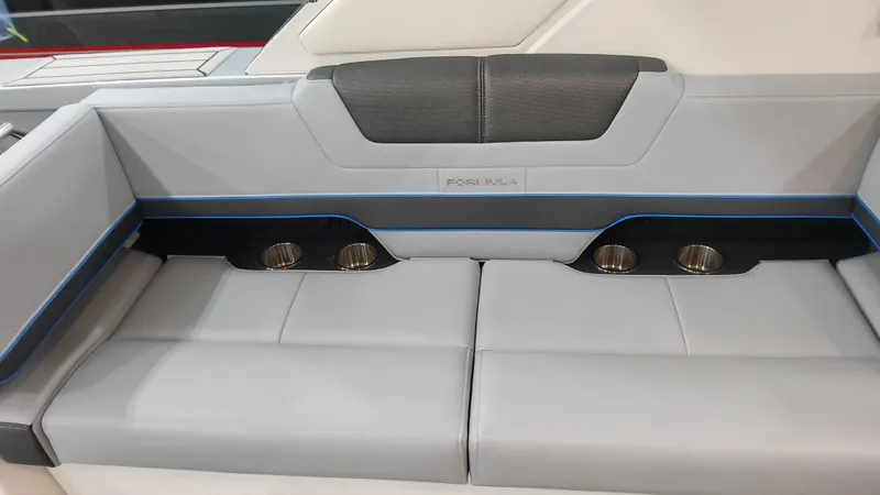 Slide: The Image of 2025 Formula 380 Super Sport Crossover OB interior seating with cup holders. - 46